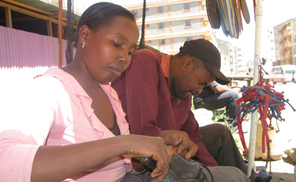 Couple beats poverty cobbling and selling shoes