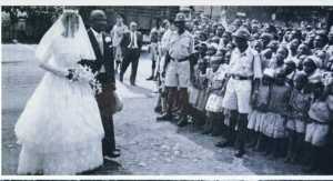  Pam Nyowila being escorted by her dad walter Odede who was a member of Legico - Bizna