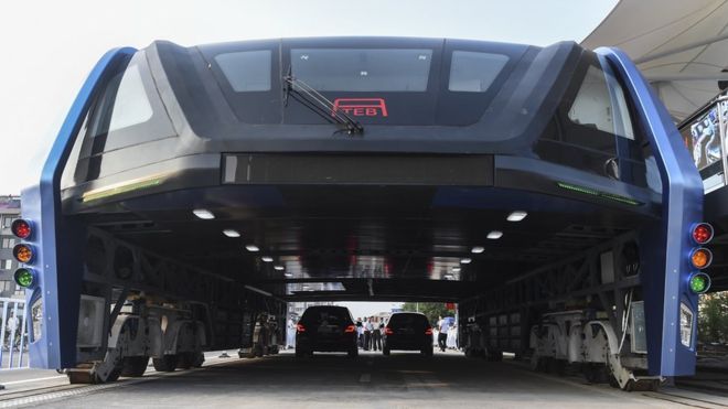 Photos: China’s elevated bus hits the road