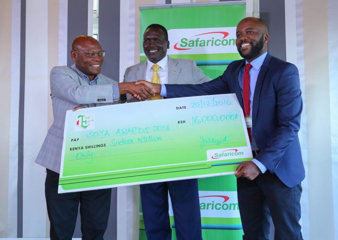 From left, Safaricom Director- Strategy and Innovation, Joseph Ogutu, SOYA Awards Founder, Paul Tergat and SOYA Panel Chairman, Watson Karuma during the launch and Cheque presentation of the 2016 Safaricom SOYA awards scheduled for 20th January 2016 - Bizna
