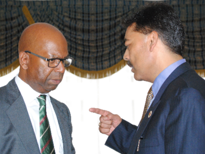 Bob Collymore and Vimal Shah