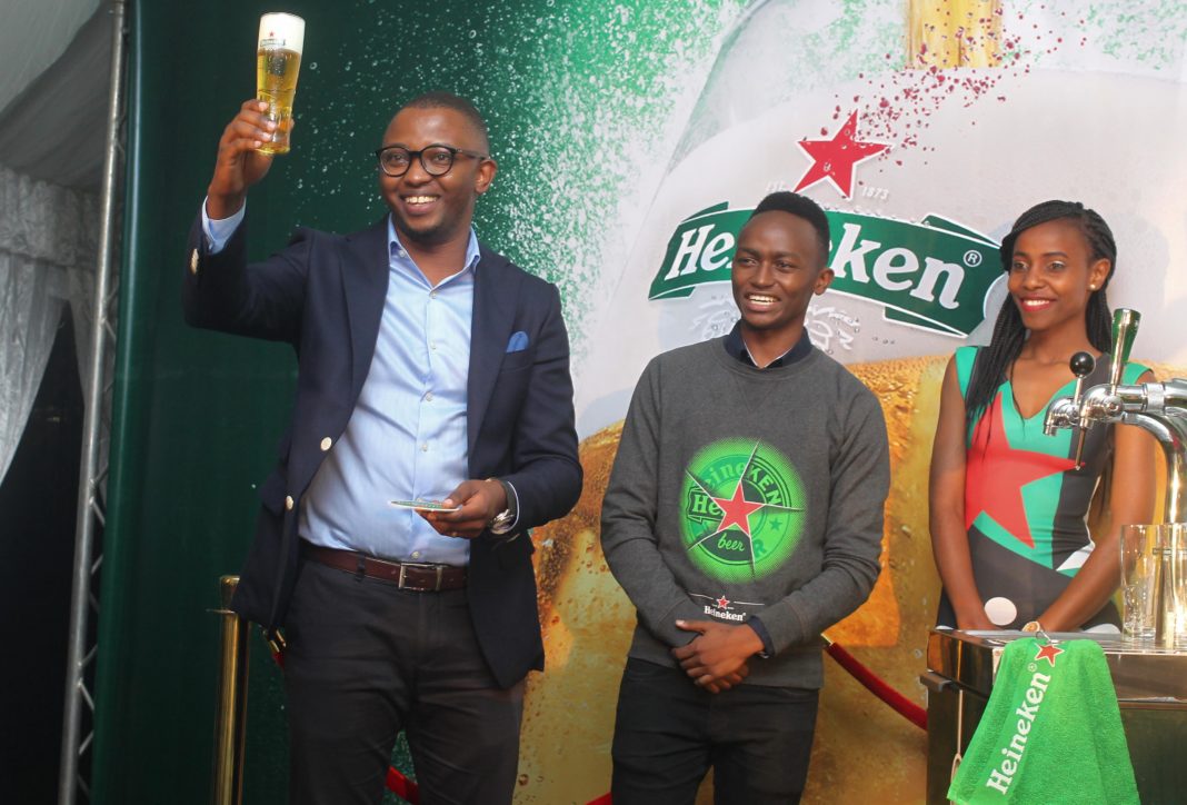 Heineken Country Manager Kenya Michael Mbungu, Junior brand manager Edwin Macharia and Brand ambassador Irene Kiende during the launch