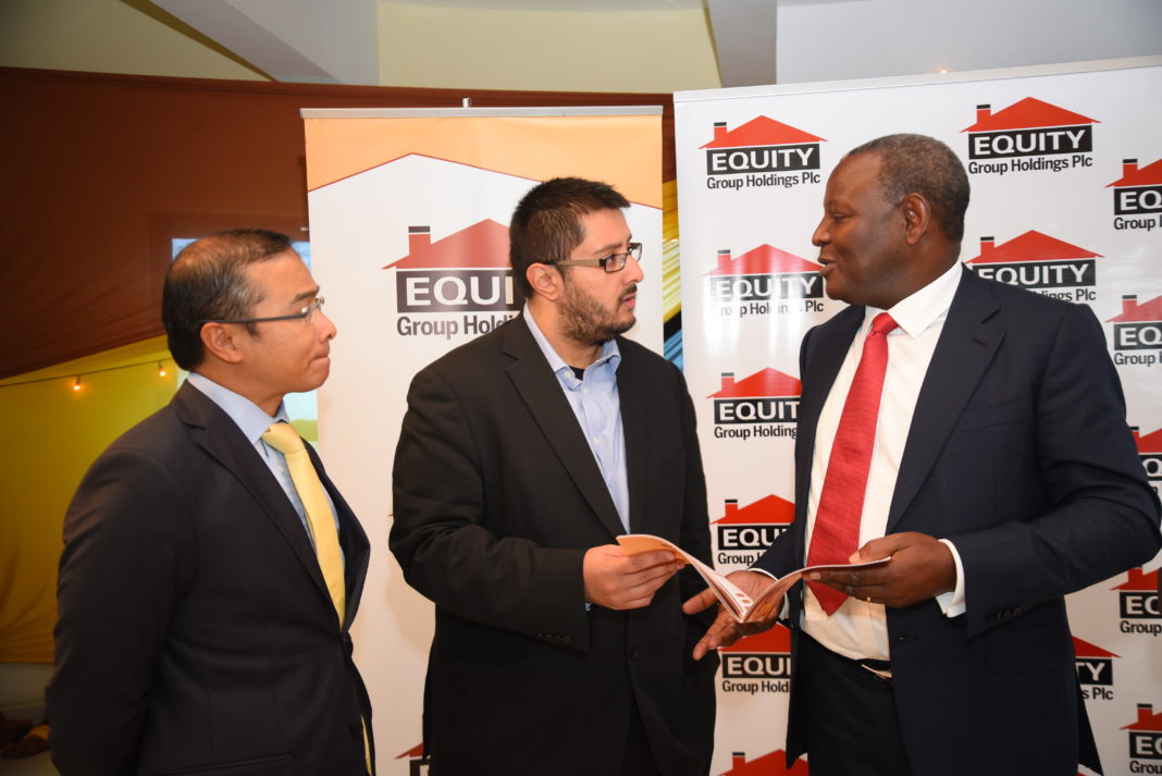 From Left: Brent Malahay, Equity Bank Group Director Strategy, Partnerships and Investor Relations looks on as Equity Group Managing Director and CEO confers with one of the analysts during the release of the 2018 Q1 Financial Results at Equity Centre, Upper Hill - Bizna
