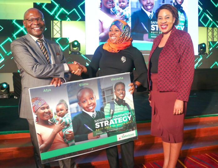 Safaricom Foundation Chairman, Joseph Ogutu is joined by Safaricom Coast Region RSO Fawzia Ali-Kimathi and Safaricom Director Enterprise Business Safaricom Foundation Trustee, Rita Okuthe to mark the unveil of the Safaricom Foundation 2018-2012 Strategy - Bizna