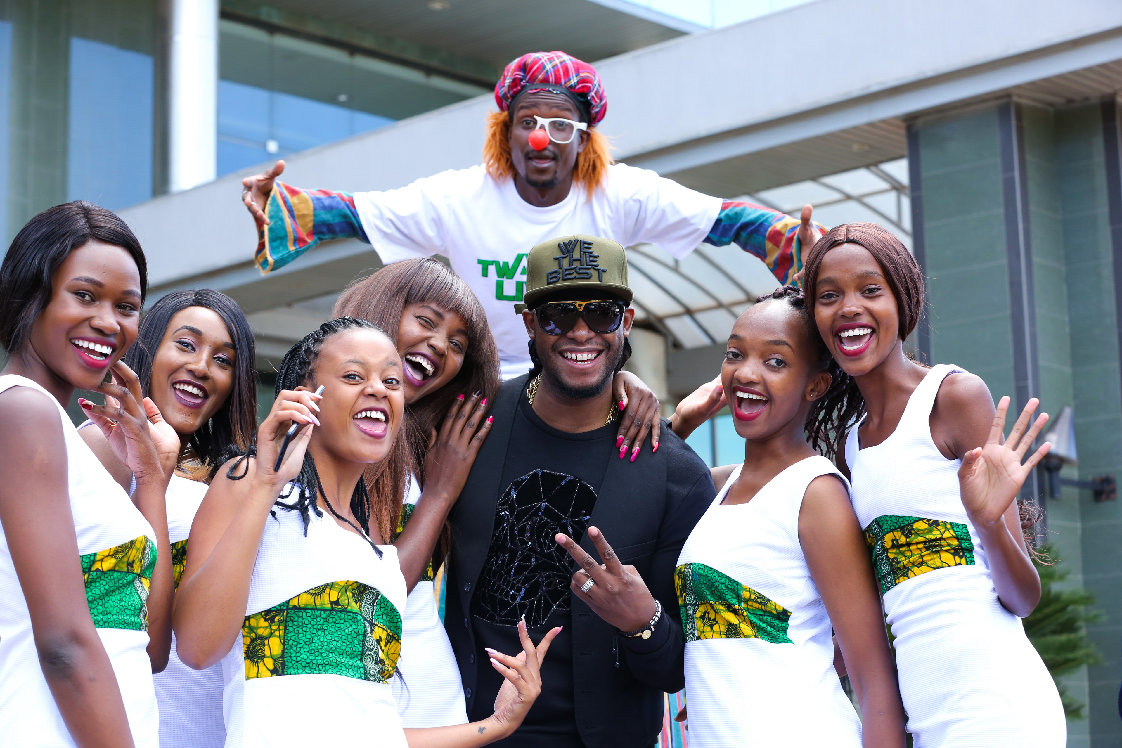 Redsan poses with models during the Safaricom Twaweza Flag off at Safaricom Headquarters. They will form art of the crew that will perform in the live concert scheduled to be held in Eldoret. - Bizna