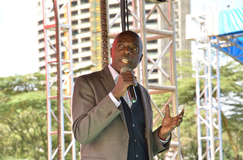 Myke Rabar, CEO Homeboyz Entertainment Limited, speaks during the launch of the Kutana KICC World Cup Festival on May 4, 2018, at the KICC Nairobi. The company has partnered with the KICC, Nairobi Bottlers, makers of Coca Cola soft drink, that will be rewarding Football fans at the World Cup viewing experience that will be held starting on June 14, 2018 until July 15, 2018 - Biznakenya.com