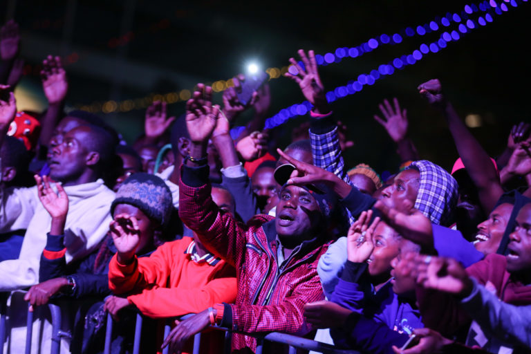 A section of Kenyan music fans enjoy performances from their favorite artists during the Safaricom Twaweza Live concert held at Kinoru stadium in Meru.