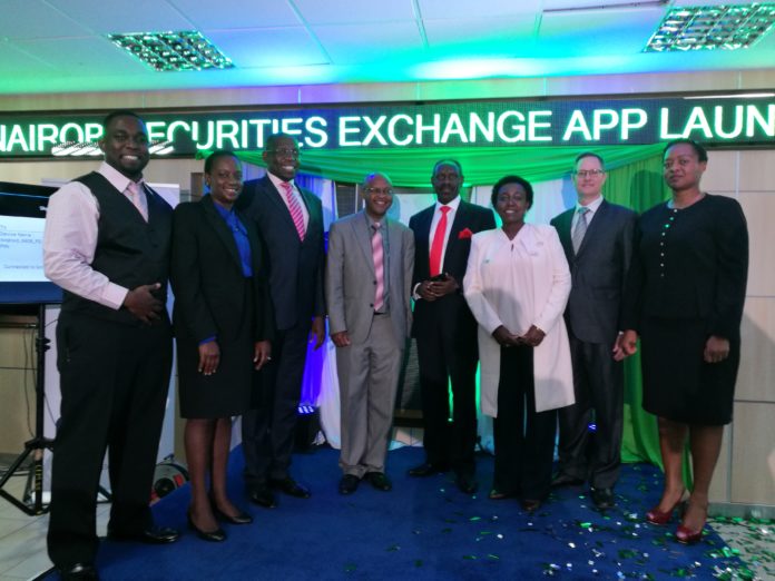 Celebrating the launch of the NSE mobile app! L-R Ooga Omanga - Director Nutcracker Technologies Kenya; Veronica Tchokech - Head of Innovation, Safaricom; Geoffrey Odundo - CEO, Nairobi Securities Exchange; John Sergon- Acting CEO, ICT Authority; Bob Karina - Vice Chairman, NSE; Sue Omanga - Director, Nutcracker Technologies Kenya; Dean Casey - Director, Nutcracker Technologies; Rose Mambo - CEO, CDSC
