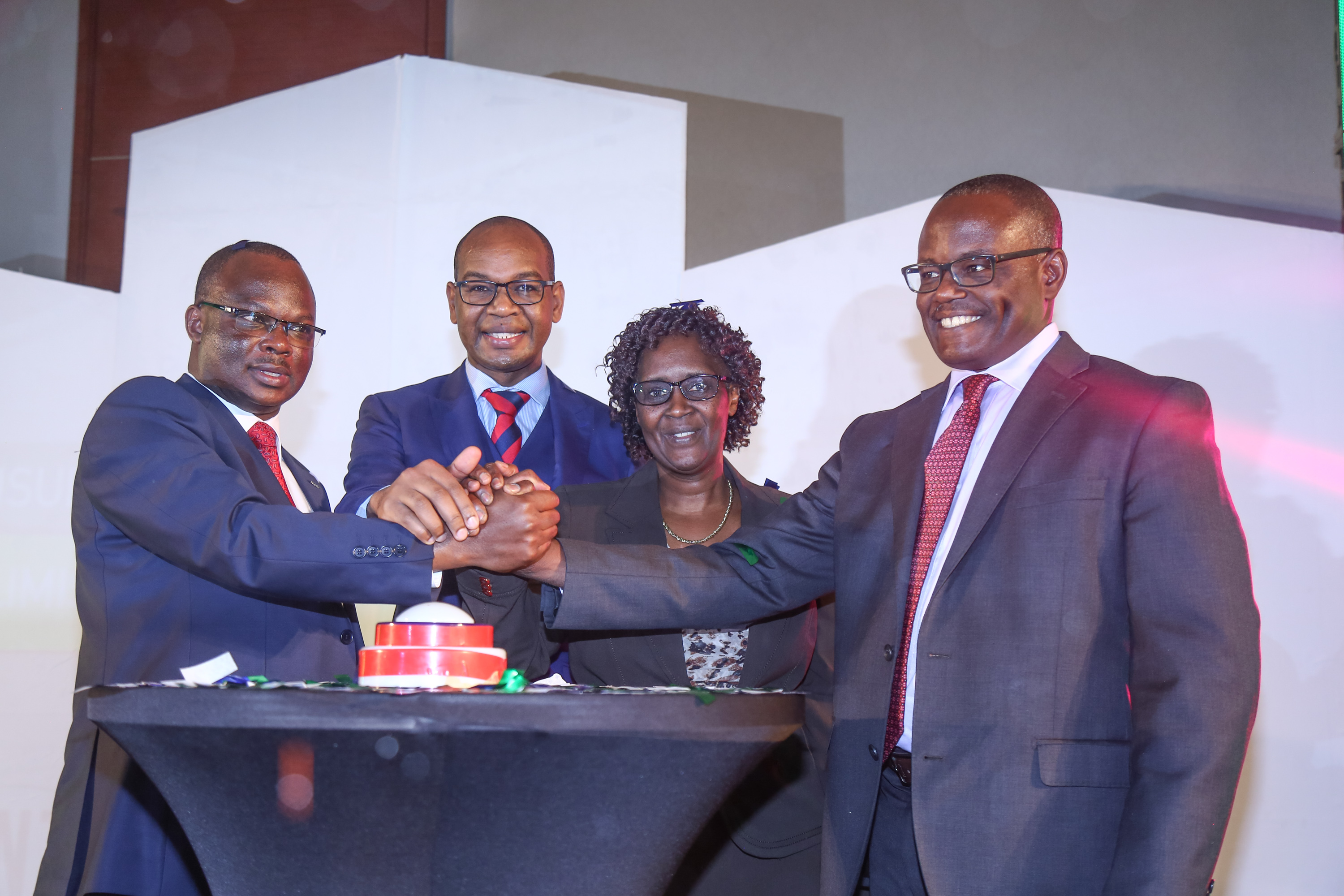 From left to right KCB Group Insurance Agency Managing Director Peter Kathanga, KCB Group Chief Executive Officer Joshua Oigara, Insurance Regulatory Authority Chief Technical Officer Agnes Ndirangu and Liberty Life Insurance Kenya Managing Director Abel Munda during the launch of KCB Elimisha Insurance product for securing education policy.