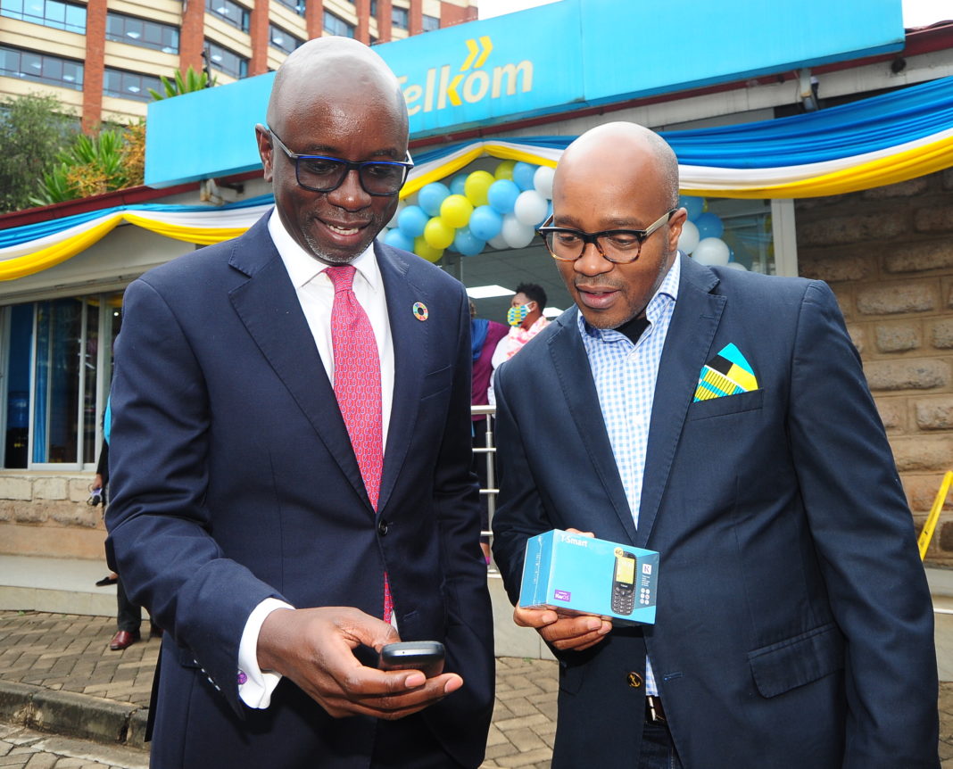 (L-R) MD, Telkom Consumer Steve Okeyo with Telkom Director, Marketing Eric Achola test the new Kaduda Smart 4G phone at Telkom shop at Ralph Bunche Rd. The introduction of the device is part on the recently launched Telkom business strategy that will focus on addressing the current digital transformation dynamic in country - Bizna Kenya