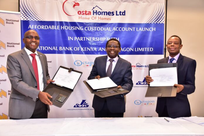 1-National Bank MD Paul Russo, Octagon Africa Group CEO Fred Waswa & Costa Homes MD Dr Constantine Mwadime during signing of partnership with Costa Homes to enhance safety of buyers of affordable housing project - Bizna Kenya