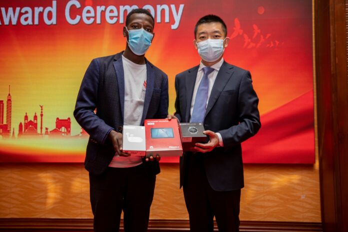 Student getting Huawei prizes - Global ICT Competition - Bizna Kenya