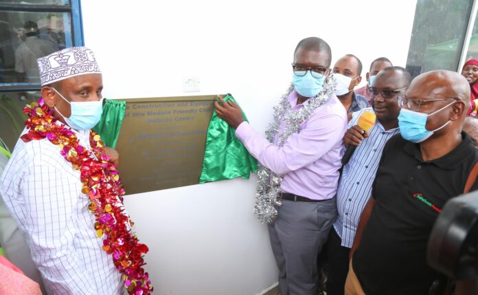 Safaricom Foundation Trustee, Barack Odero (right) and Garissa Governor H.E Alo Bunow Korane unveil the children’s diabetes management centre at the Garissa Referral Hospital constructed and equipped by the Safaricom Foundation - Bizna Kenya