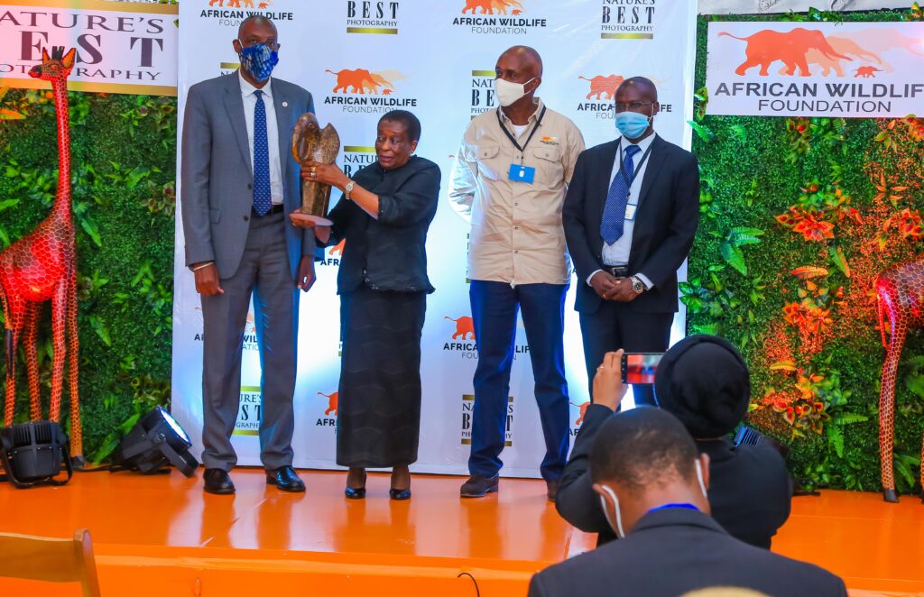 From left to right, AWF CEO, Kaddu Sebunya, Mrs Anna Mkapa, KCB Chairman, Andrew Kairu and Dr. Kiprop Langat, Director, Department of Culture, Ministry of Sports, Culture and Heritage share a photo moment post the launch - Bizna Kenya