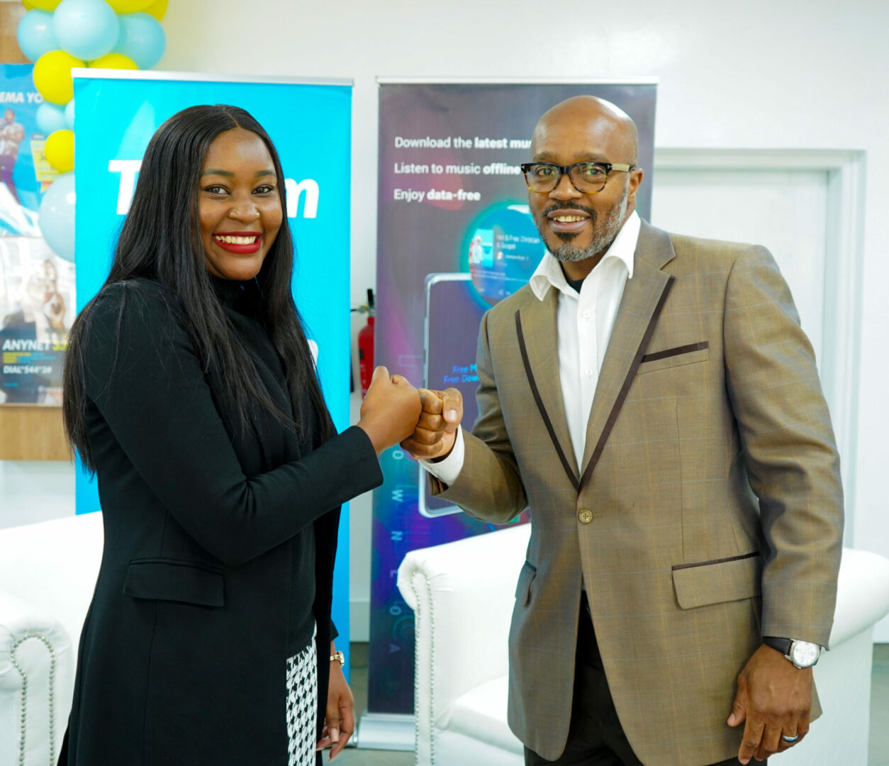 Martha Huro, Boomplay’s Managing Director of East Africa and Telkom’s Marketing Director, Eric Achola - Bizna Kenya