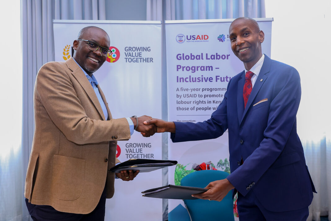 KBL Managing Director, John Musunga (left) and SightSavers Country Director, Moses Chege during an MOU signing ceremony where they entered into a partnership to mainstream inclusion of persons with disabilities into formal employment at Kenya Breweries Limited - Bizna Kenya