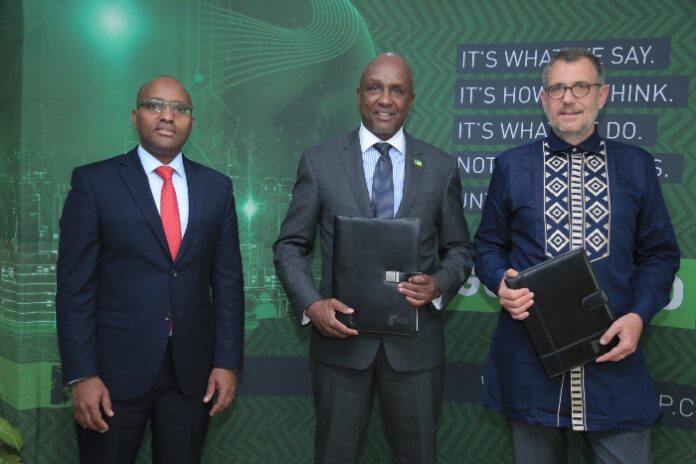 KCB Group PLC CEO Paul Russo, KCB Group Chairman Andrew Wambari Kairu and Oliver Meisenberg, the Chief Executive Officer Trust Merchant Bank (TMB) pose for a photo earlier today during a ceremony where KCB signed a definitive agreement to acquire a majority stake atTMB. TMB is a commercial bank based in the Democratic Republic of Congo (DRC). The acquisition is aligned to the Group’s bid to scale its regional presence and access to the new Member of the East African Community - Bizna Kenya