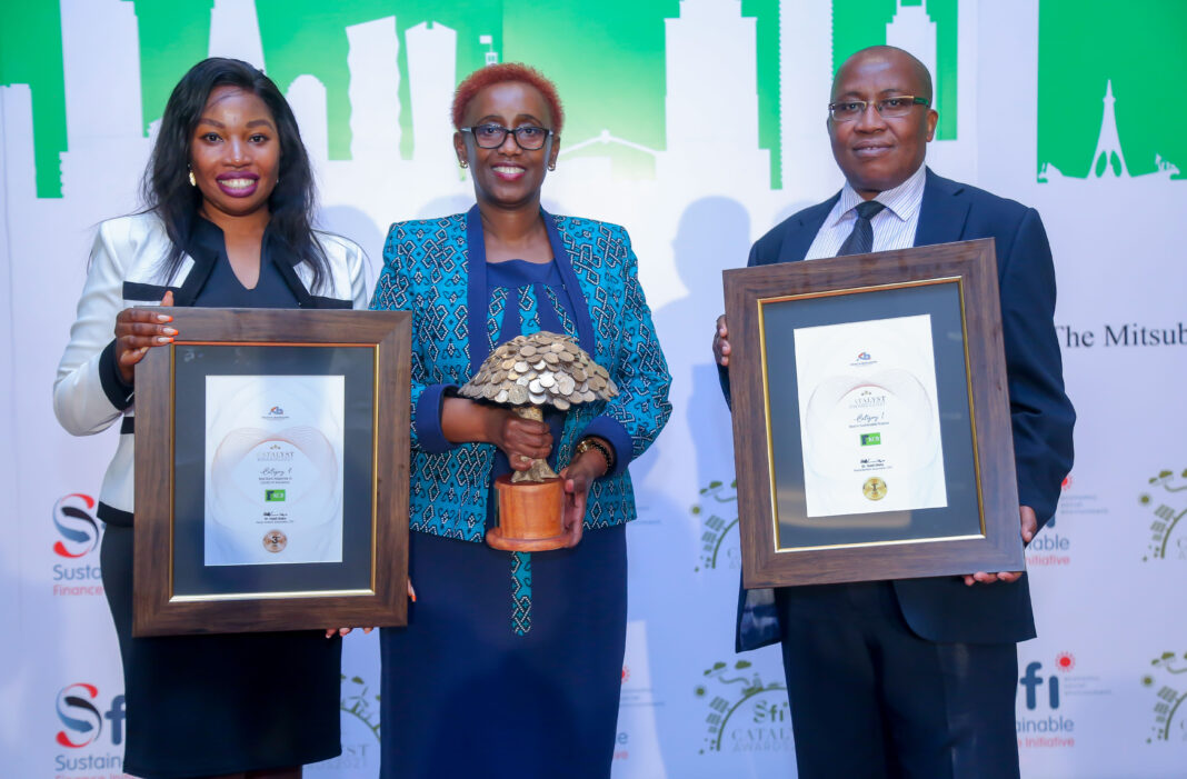Judith Sidi Odhiambo, Head Of Corporate Affairs and Sustainability at KCB, Charllotte Obado, Sustainability Coordinator at KCB, and Jacob Unda, Senior Manager of Credit Quality and Policy Management at KCB, pose for a photo with their best Sustainable Finance strategy during the Catalyst Awards.