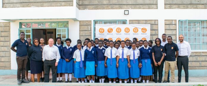 Superior Homes Kenya team with beneficiaries of 'The Future is Female' initiative as the Company donated sanitary towels at Kenanie Secondary School - Bizna Kenya