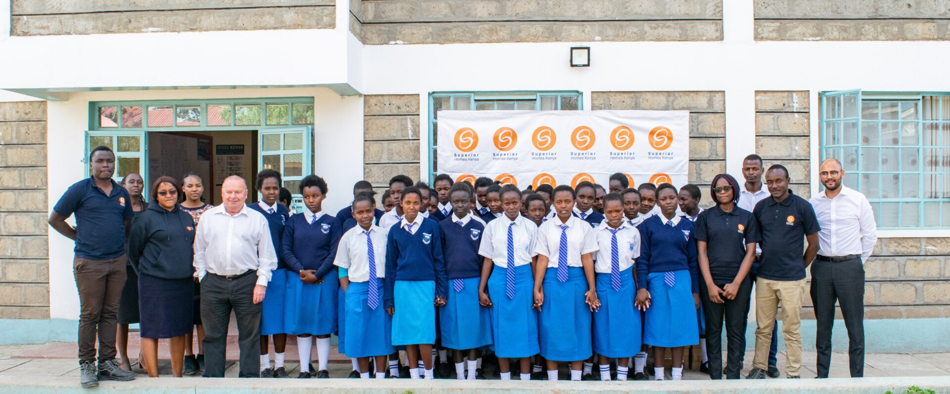 Superior Homes Kenya team with beneficiaries of 'The Future is Female' initiative as the Company donated sanitary towels at Kenanie Secondary School - Bizna Kenya