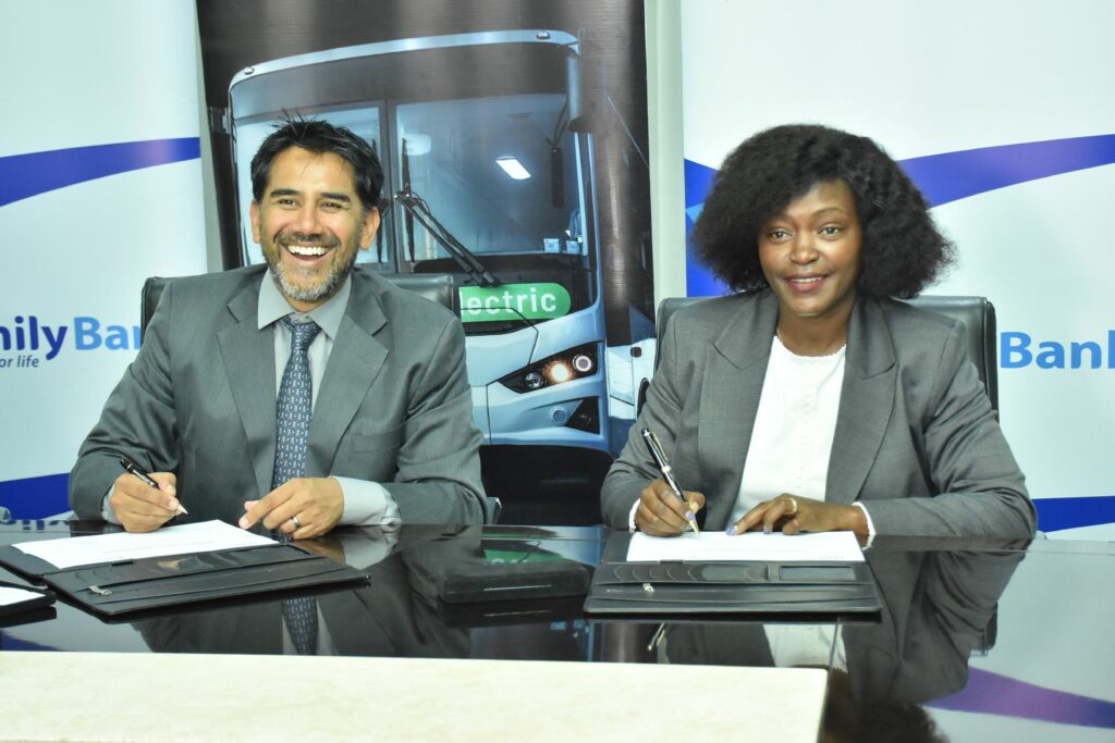 BasiGo CEO and Co-Founder Jit Bhattacharya & Family Bank CEO Rebecca Mbithi sign an asset finance deal that will enable PSV players access up to 90 per cent financing, with an extended loan repayment period of 48 months for the purchase of electric buses - Bizna Kenya
