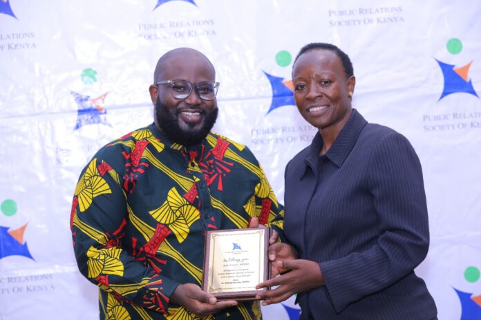 Public Relations Society of Kenya-PRSK, President, Mr. Arik Karani, (left) poses with PRSK Secretary Ms. Noella Mutanda (right) during a past PRSK event - Bizna Kenya