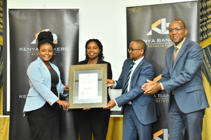 Family Bank Customer Experience Manager Maureen Ndegwa, Head of Service Excellence Joyce Mwangi & Chief Operations Officer John Ndugi receive an award from Kenya Bankers Association Director of Technical Services Fidelis Muia (R) where the bank was voted overall second best bank and best tier two bank in customer responsiveness & digital banking experience in 2022 - Bizna Kenya (Picture Courtesy)