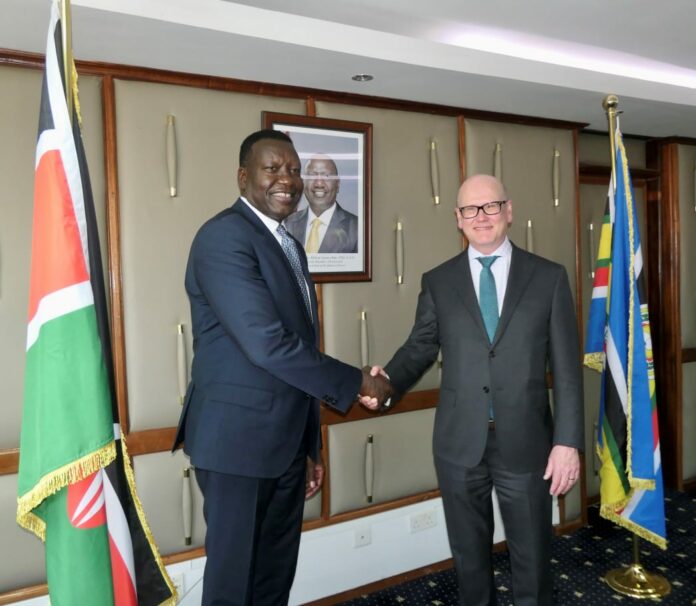 European Investment Bank Vice President, Thomas Ostros (R), with Cabinet Secretary for Energy, Davis Chirchir share pleasantries after the signing of an agreement to support Kenya's green hydrogen production - Bizna Kenya (Picture Courtesy)