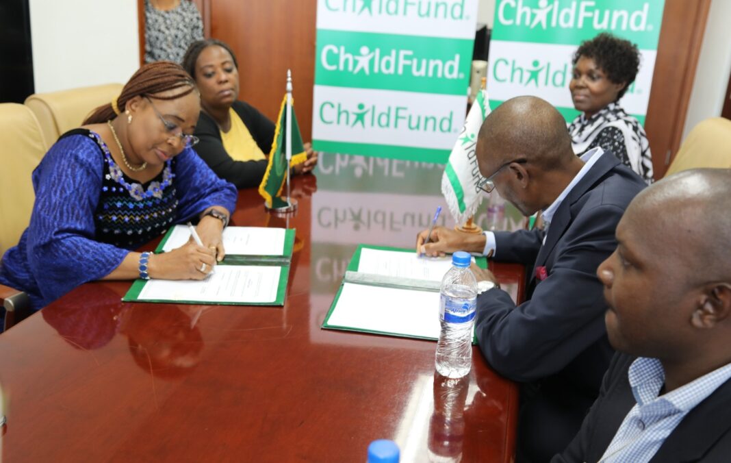 ChildFund Africa Regional Director Chege Ngugi (right) and Amb. Minata Samaté Cessouma (left) – the AU Commissioner for Health, Humanitarian Affairs and Social Development, during the signing of the MoU between ChildFund and Africa Union Commission in Addis Ababa, Ethiopia - Bizna Kenya | Picture Courtesy