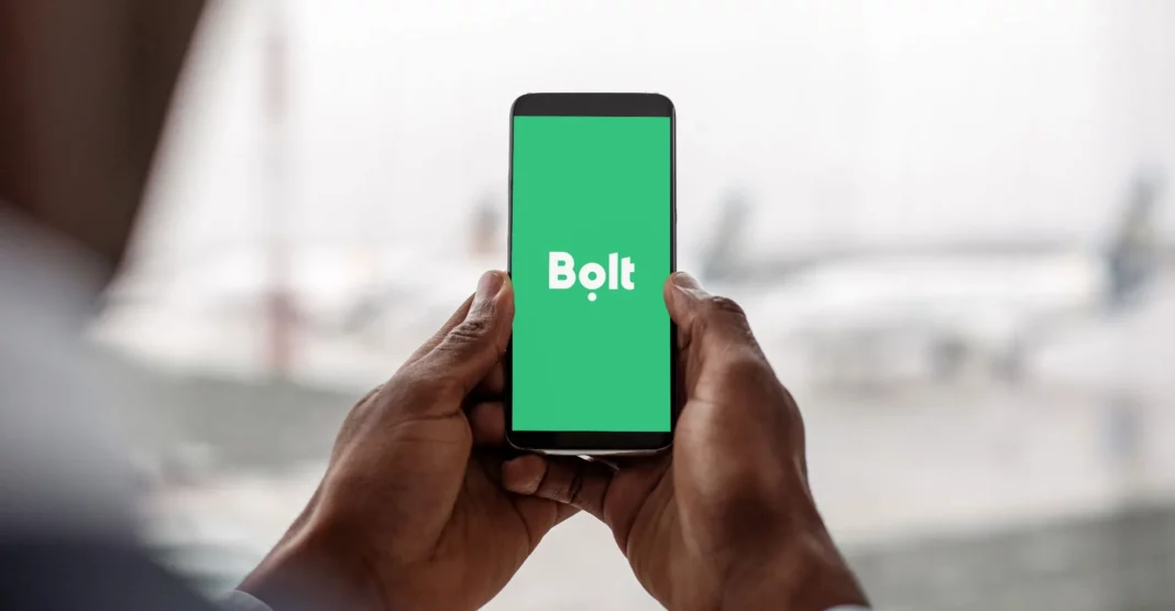 A customer opening the Bolt taxi-hailing app