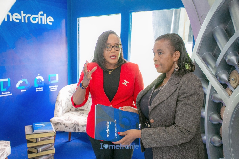 Metrofile Kenya Managing Director Jackline Mburu and Cabinet Secretary Dr. Margaret Nyambura Ndung’u at the 8th Records Management Conference