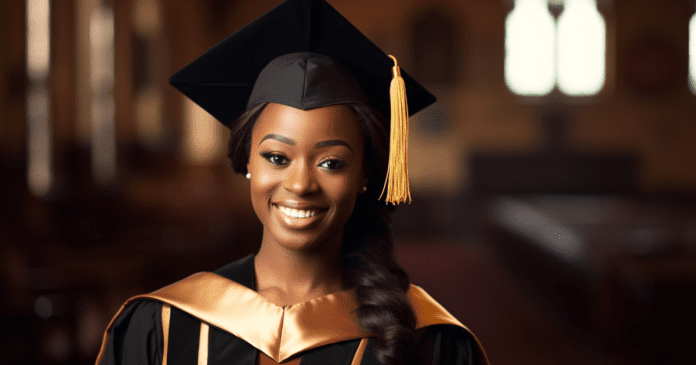 A black female graduate in graduating gown.