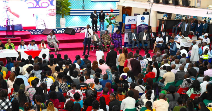 CS Mutua speaking to job seekers at a Kasarani church.