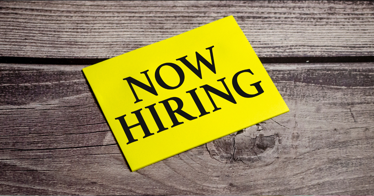 In the yellow sticker the text concept word Now Hiring Free Photo