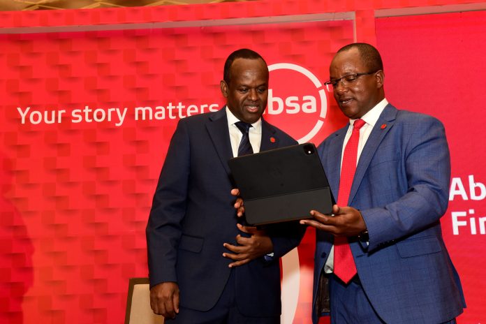 Absa Bank Kenya MD and CEO Abdi Mohamed with Chief Finance Officer Yusuf Omari