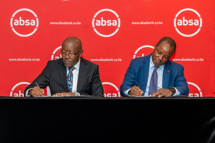 Unilever Kenya Managing Director Luck Ochieng (left) and Absa Bank Kenya PLC Interim Chief Executive Officer Yusuf Omari sign a Memorandum of Understanding to launch a KES 4 billion distributor financing programme aimed at strengthening Kenya's FMCG supply chain and supporting the growth of distributors and retailers.