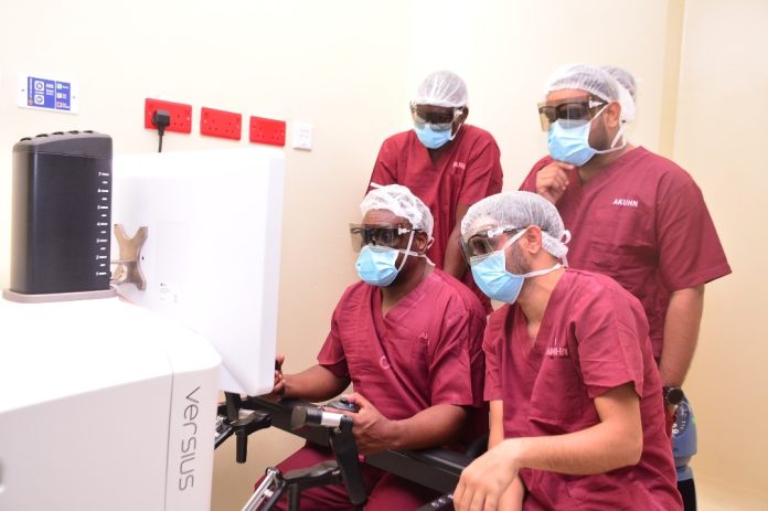 Dr Elkanah Omenge Chair Department of obstetrics and gynaecology leads a team of clinicians in conducting the 1st robotic surgery to remove ovarian cyst