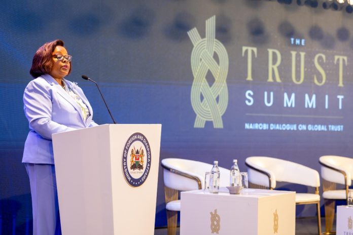 Addressing delegates at The Trust summit.